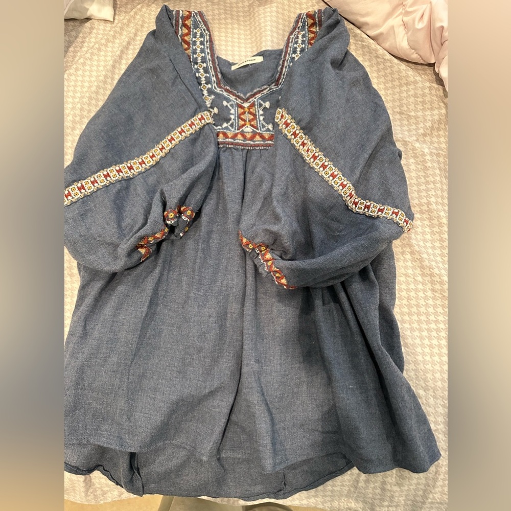 Small blouse hand stitched